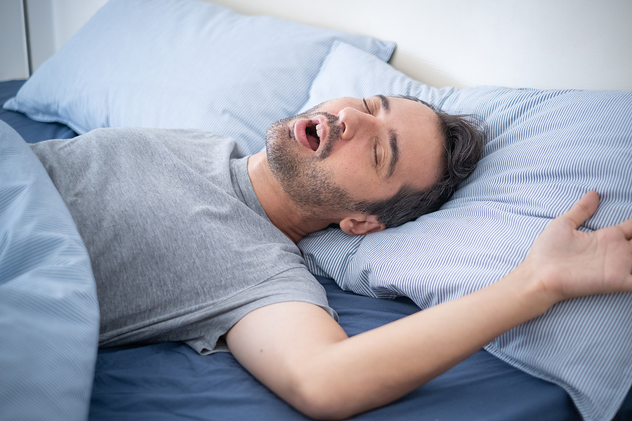 Man sleeping with his mouth open